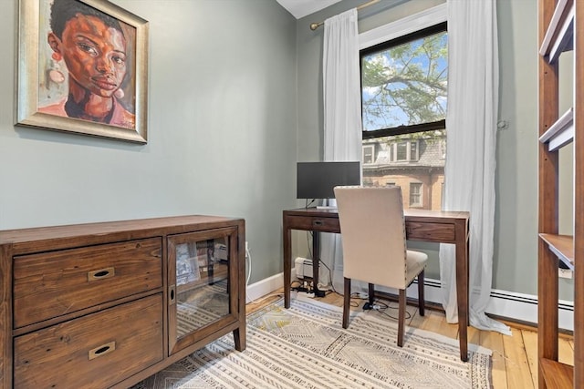 81 E Brookline St Unit 3, Boston, MA 02118 - office area with baseboards and wood finished floors