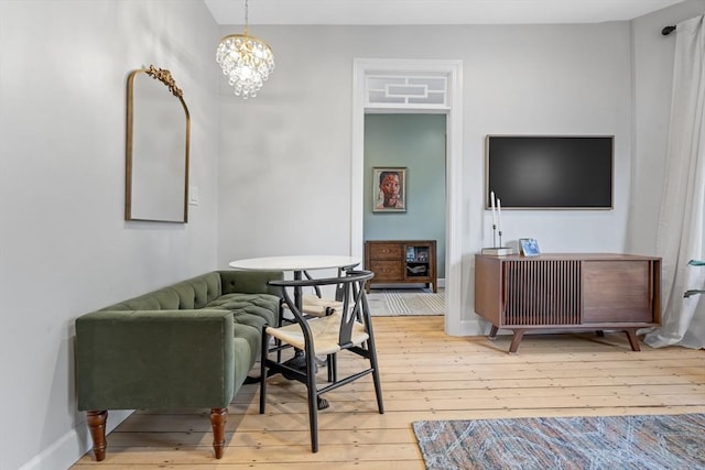 81 E Brookline St Unit 3, Boston, MA 02118 - living area with hardwood / wood-style floors and a chandelier
