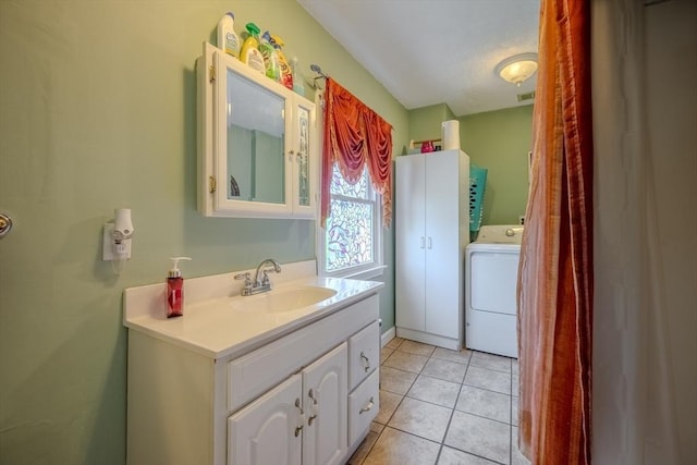 342 Townsend Rd, Groton, MA 01450 - bathroom featuring washer / dryer, vanity, and tile patterned flooring