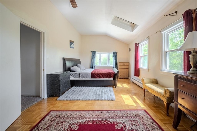 342 Townsend Rd, Groton, MA 01450 - bedroom featuring multiple windows, vaulted ceiling, a baseboard radiator, and a ceiling fan