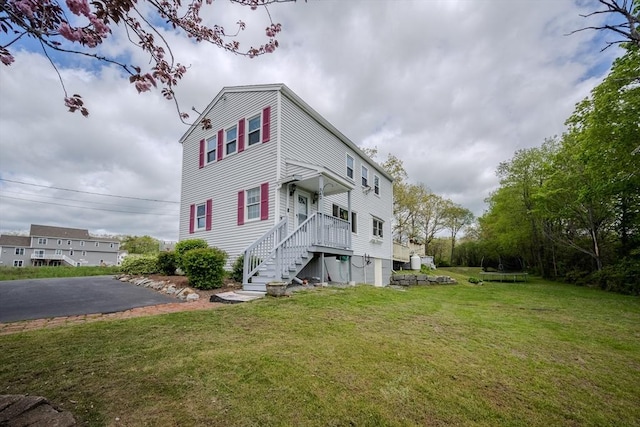 342 Townsend Rd, Groton, MA 01450 - back of house featuring a lawn