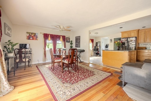 342 Townsend Rd, Groton, MA 01450 - dining room with light wood-style floors, ceiling fan, and baseboards
