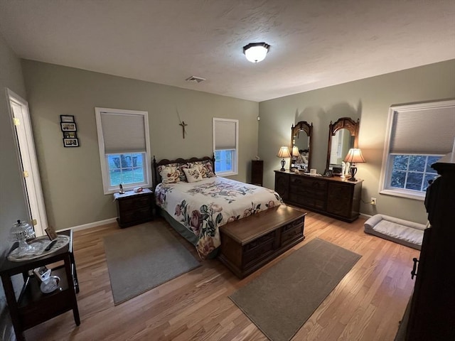 bedroom featuring light hardwood / wood-style floors