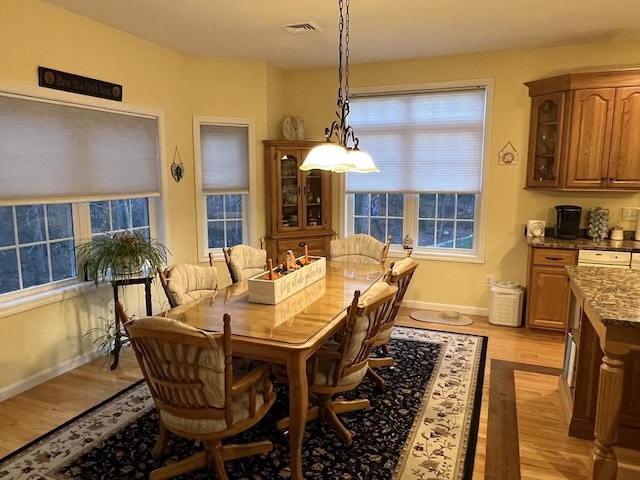 dining room featuring light hardwood / wood-style floors