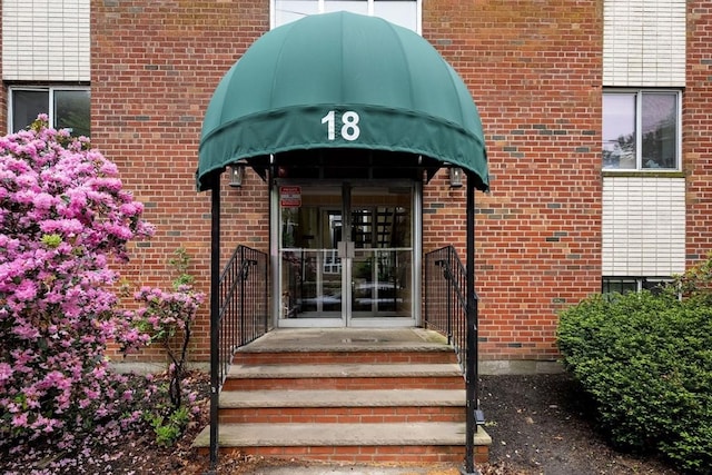 18 Pond St Unit 2, Boston, MA 02130 - doorway to property featuring french doors and brick siding