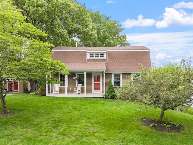 4 Elizabeth Rd, Hudson, MA 01749 - back of house with roof with shingles, covered porch, a yard, and a gambrel roof