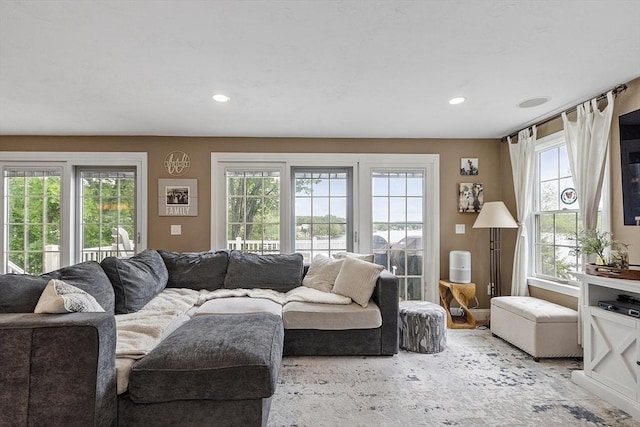 4 Elizabeth Rd, Hudson, MA 01749 - carpeted living room with plenty of natural light and recessed lighting