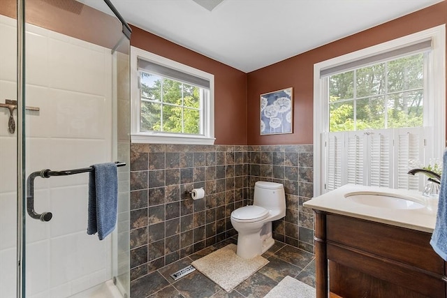 4 Elizabeth Rd, Hudson, MA 01749 - full bathroom with plenty of natural light, tile walls, a shower stall, toilet, and vanity