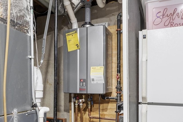 4 Elizabeth Rd, Hudson, MA 01749 - utility room with tankless water heater