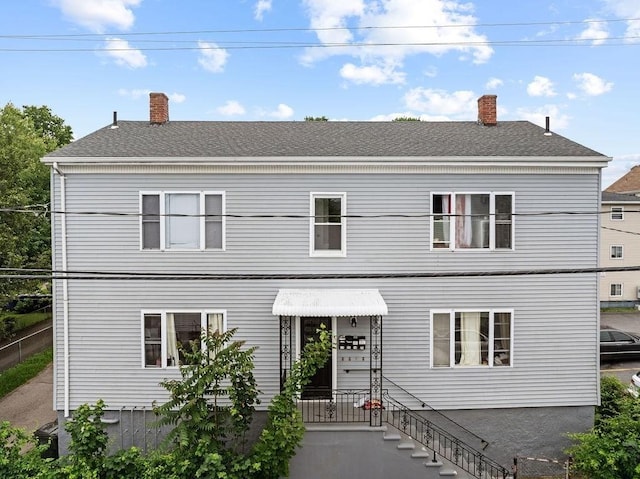 135 Snell, Fall River, MA 02721 - view of front of property featuring a chimney and roof with shingles