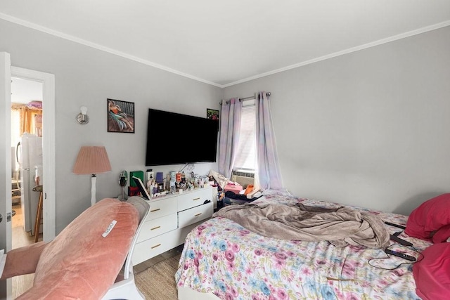 135 Snell, Fall River, MA 02721 - bedroom with crown molding, freestanding refrigerator, and wood finished floors