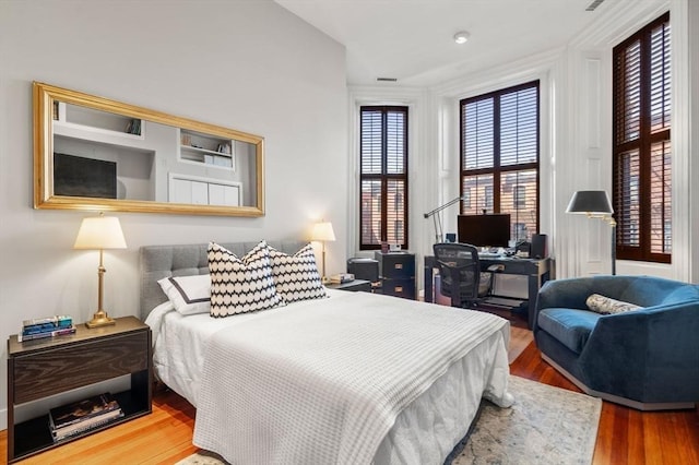 bedroom featuring wood finished floors