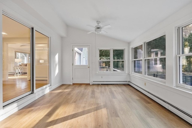 unfurnished sunroom featuring ceiling fan, baseboard heating, and vaulted ceiling