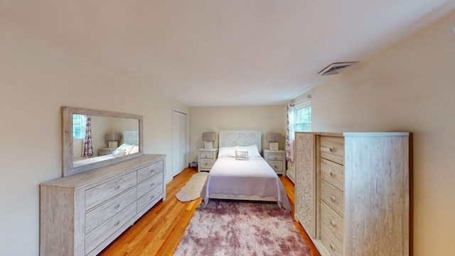 bedroom featuring hardwood / wood-style flooring