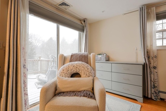 living area featuring light hardwood / wood-style floors