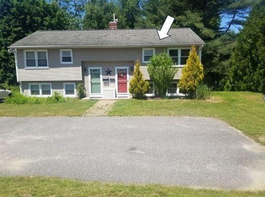 65 Reservoir St Unit 65, Holden, MA 01520 - bi-level home with a front lawn, a chimney, and view of wooded area