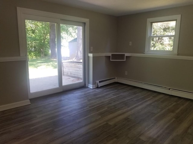 65 Reservoir St Unit 65, Holden, MA 01520 - unfurnished room featuring healthy amount of natural light, dark wood-style flooring, and a baseboard radiator