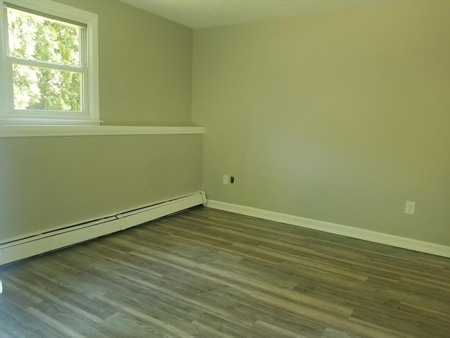 65 Reservoir St Unit 65, Holden, MA 01520 - empty room with baseboard heating, baseboards, and wood finished floors