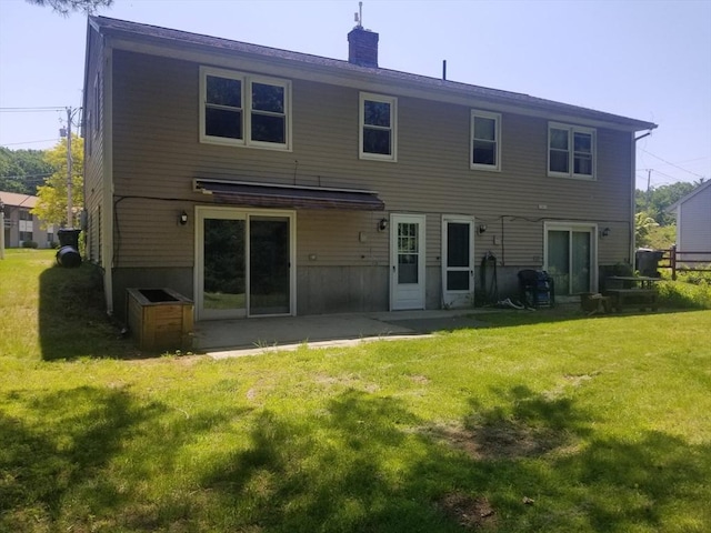 65 Reservoir St Unit 65, Holden, MA 01520 - rear view of house with a yard and a chimney