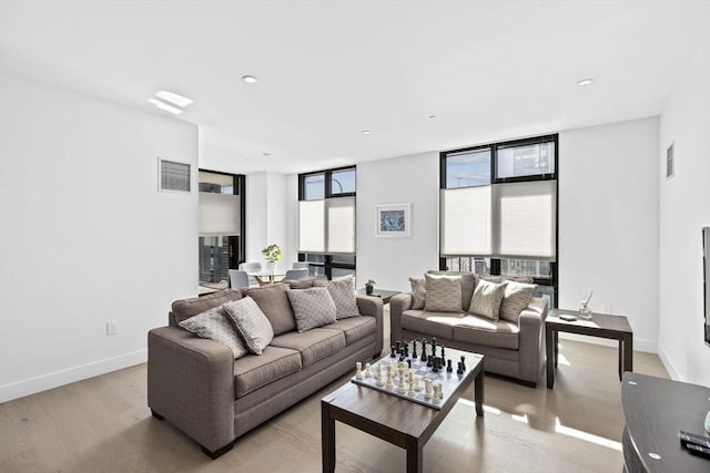 living room featuring light wood-type flooring