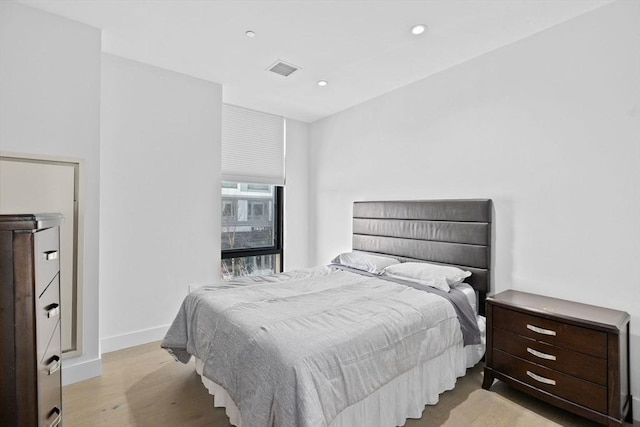 bedroom featuring light hardwood / wood-style floors