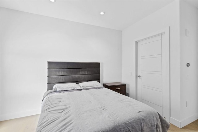 bedroom featuring light wood-type flooring