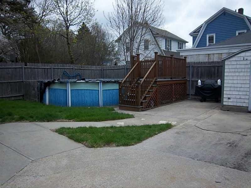 view of swimming pool featuring a fenced backyard, a deck, a patio, and a fenced in pool
