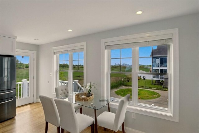 1089 Winthrop Ave Unit A, Revere, MA 02151 - dining space featuring healthy amount of natural light, light wood-style floors, recessed lighting, and baseboards