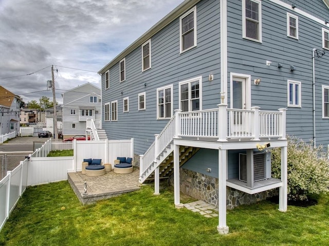 1089 Winthrop Ave Unit A, Revere, MA 02151 - back of property featuring stairway and a wooden deck