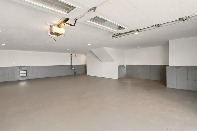 1089 Winthrop Ave Unit A, Revere, MA 02151 - garage with a garage door opener and recessed lighting