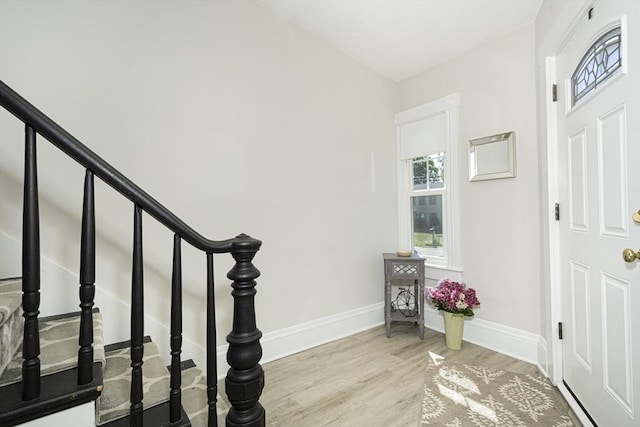 29 Maple St Unit 2, Uxbridge, MA 01569 - foyer featuring wood finished floors and baseboards