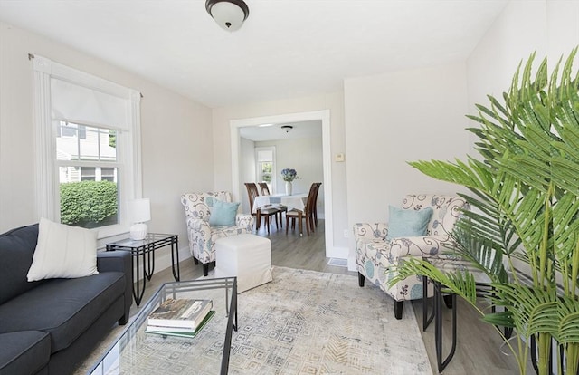 29 Maple St Unit 2, Uxbridge, MA 01569 - living area featuring wood finished floors and baseboards