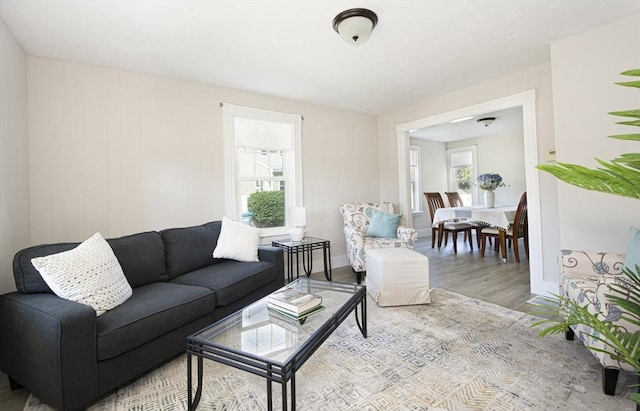 29 Maple St Unit 2, Uxbridge, MA 01569 - living room featuring healthy amount of natural light and wood finished floors