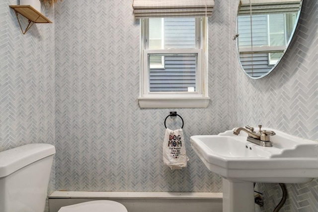 40 Fowler Ave, Revere, MA 02151 - half bathroom featuring tile walls and toilet