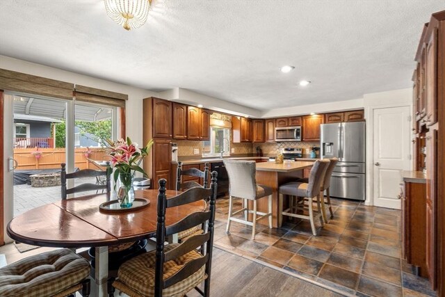 40 Fowler Ave, Revere, MA 02151 - dining area featuring a textured ceiling and recessed lighting