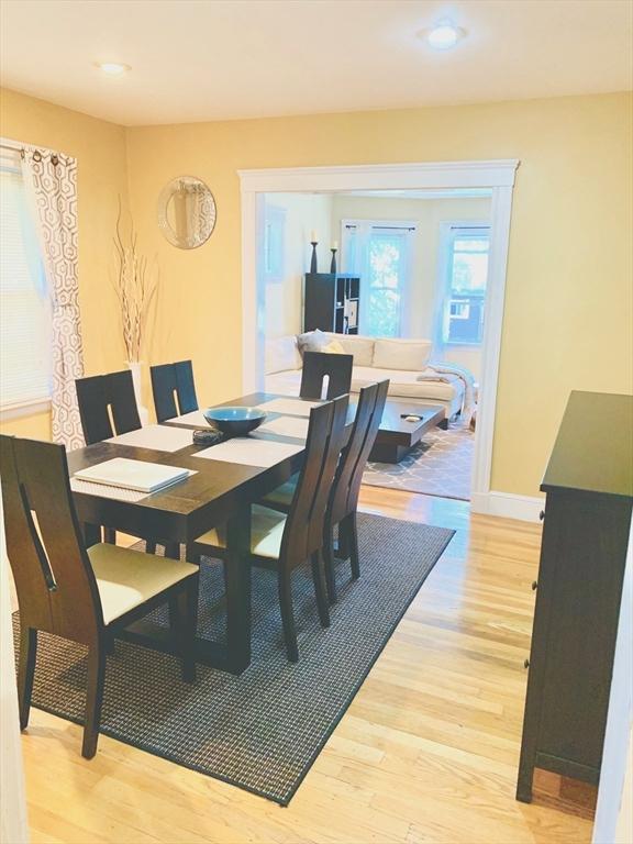 dining room featuring recessed lighting, baseboards, and light wood finished floors