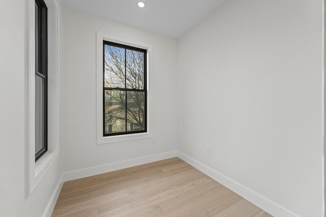 unfurnished room featuring light wood-type flooring