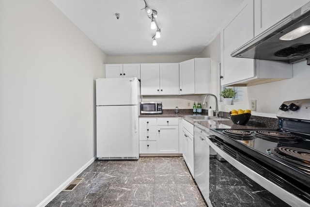289 Market St Unit B, Boston, MA 02135 - kitchen with appliances with stainless steel finishes, under cabinet range hood, a sink, and white cabinetry