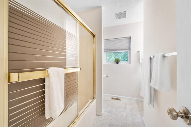 289 Market St Unit B, Boston, MA 02135 - bathroom with baseboards, enclosed tub / shower combo, and marble finish flooring