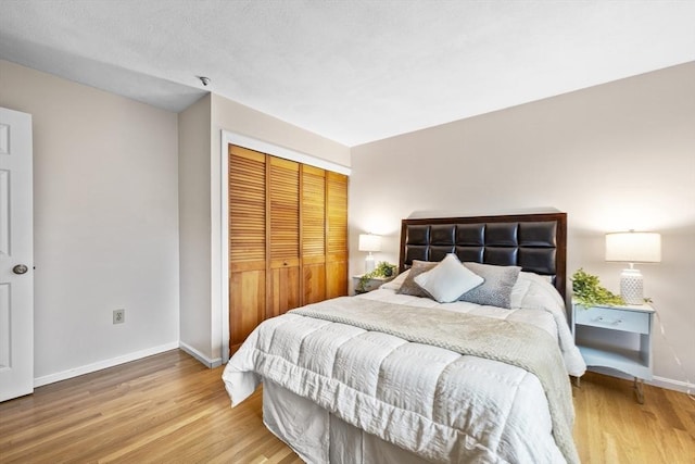 289 Market St Unit B, Boston, MA 02135 - bedroom with baseboards, wood finished floors, and a closet