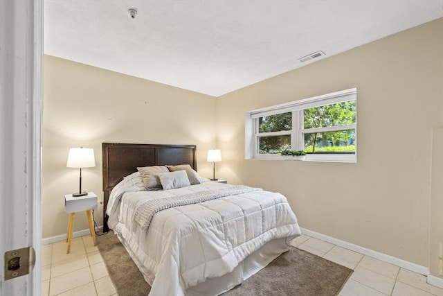 289 Market St Unit B, Boston, MA 02135 - tiled bedroom featuring baseboards