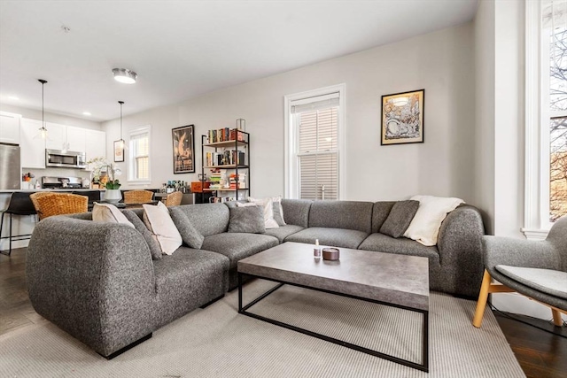 living area featuring recessed lighting and light wood-style floors