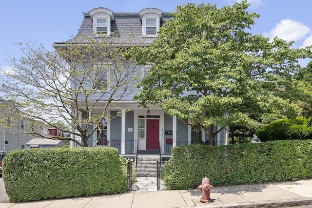 38 Spring St, Somerville, MA 02143 - victorian home with covered porch and mansard roof