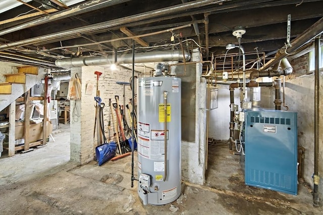 38 Spring St, Somerville, MA 02143 - utility room with gas water heater and a heating unit