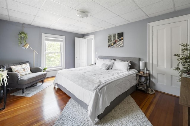 38 Spring St, Somerville, MA 02143 - bedroom featuring a paneled ceiling and wood finished floors