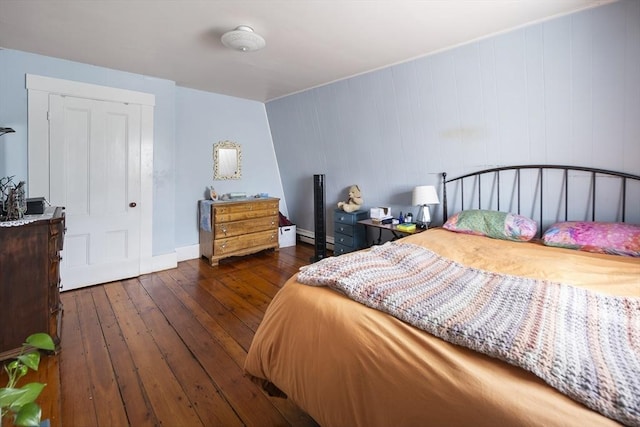 38 Spring St, Somerville, MA 02143 - bedroom with wood-type flooring and baseboards