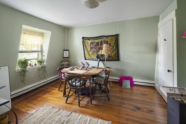 38 Spring St, Somerville, MA 02143 - dining space featuring a baseboard heating unit and hardwood / wood-style floors
