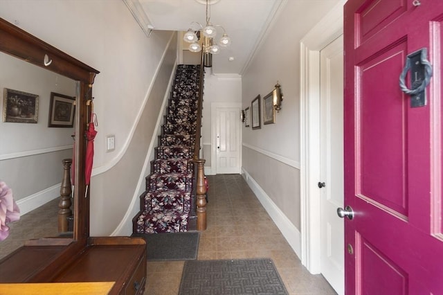 38 Spring St, Somerville, MA 02143 - foyer entrance with crown molding, stairway, a chandelier, and light tile patterned flooring