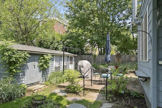 38 Spring St, Somerville, MA 02143 - view of yard with an outdoor structure and a wooden deck