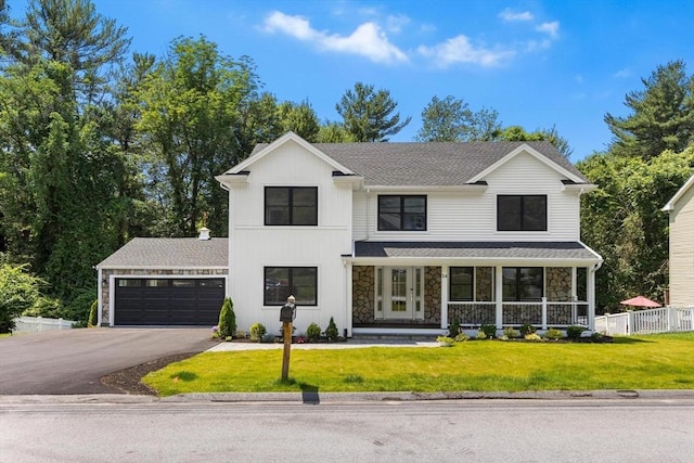 14 Corcoran Rd, Burlington, MA 01803 - modern farmhouse with stone siding, a garage, driveway, covered porch, and a shingled roof